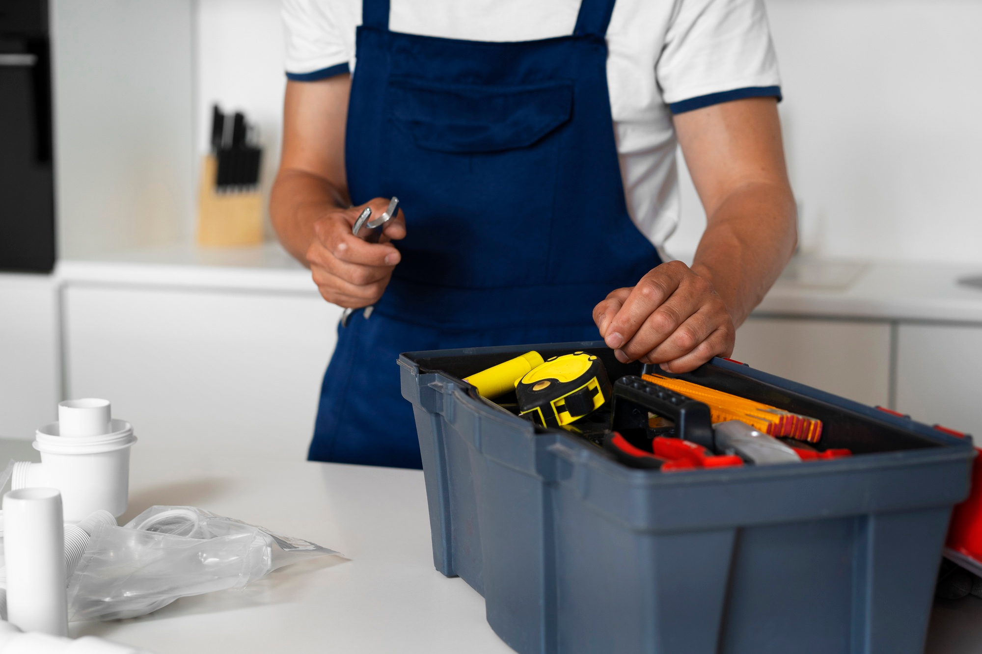 handyman preparing tools for home repair work